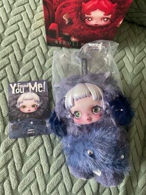 Bundle of four skull panda dolls